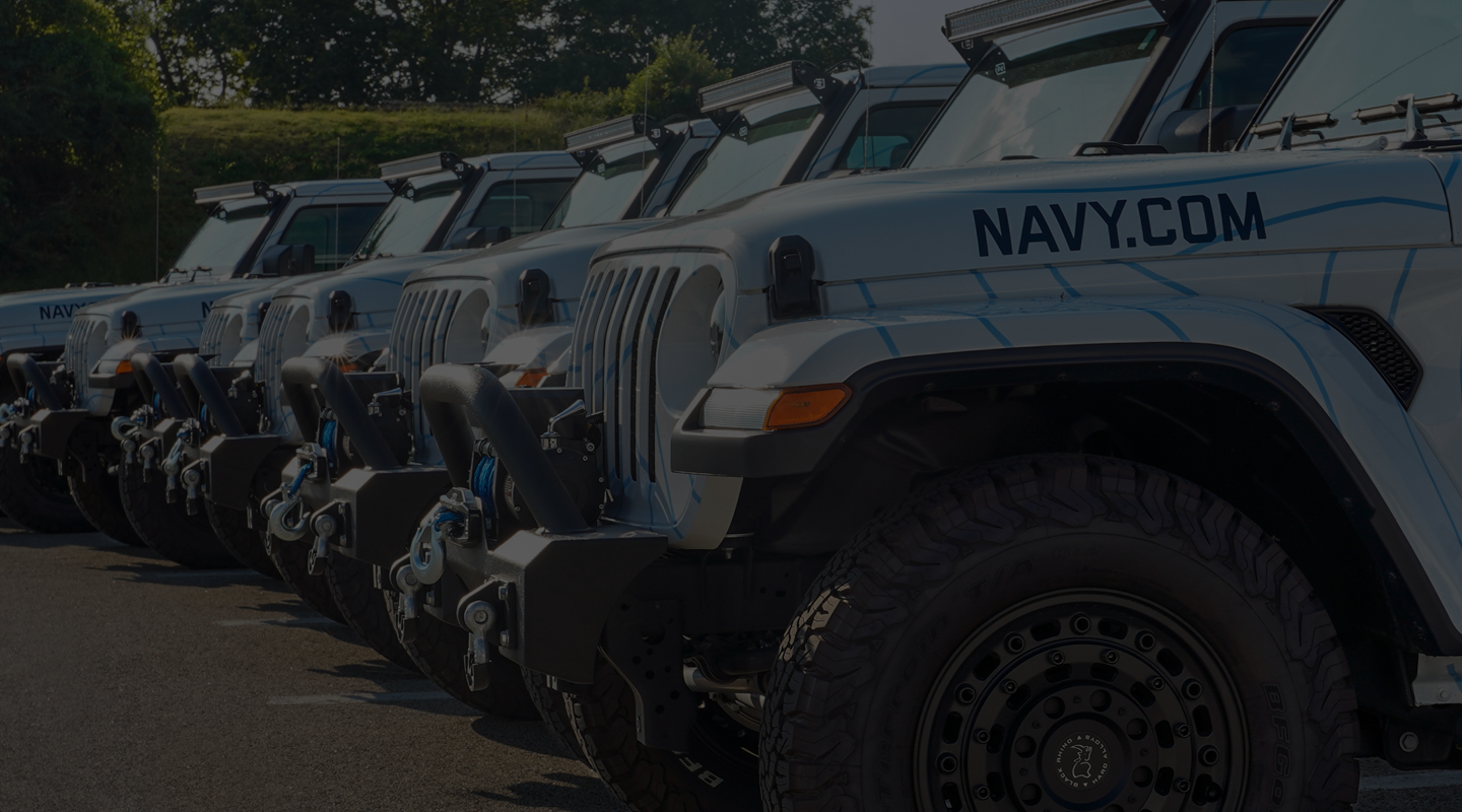 Line of vehicles from The Strike Group experience from America's Navy