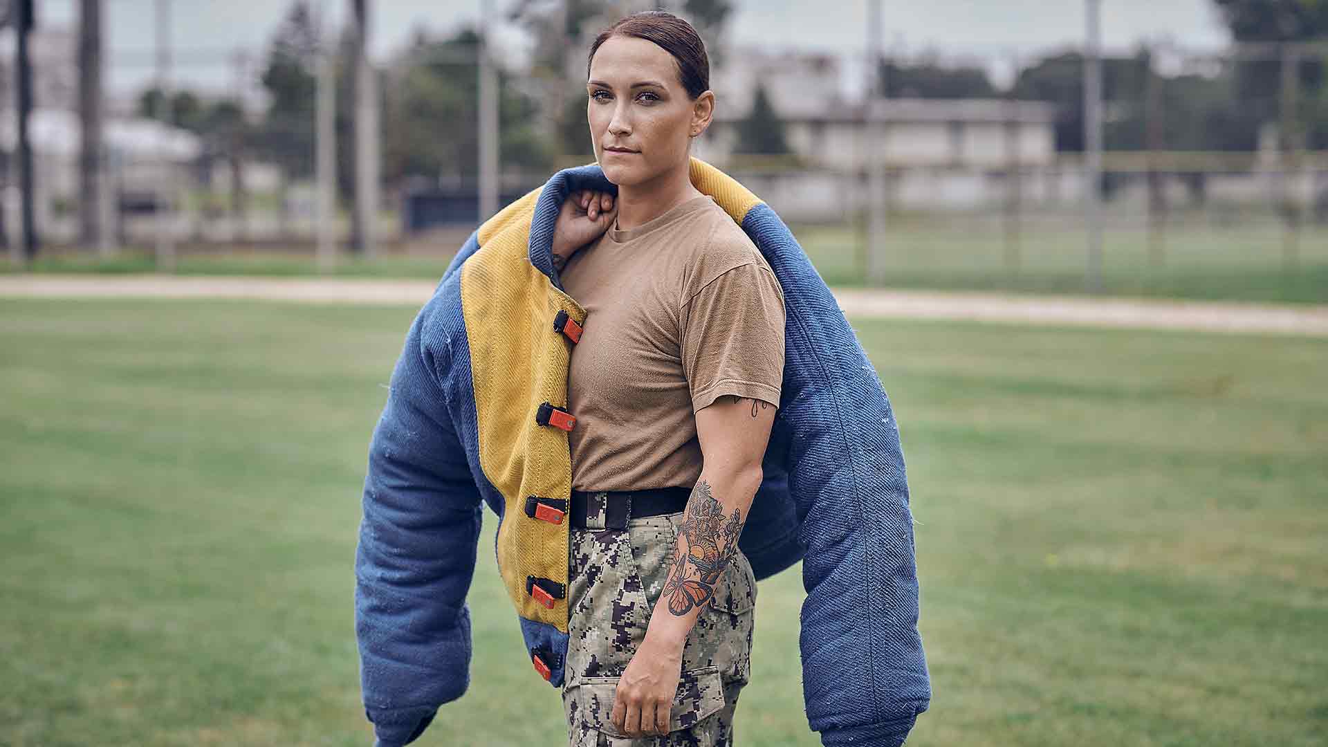 Rachel Higuera poses for a photo in her K9 training gear