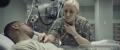 US female navy nurse examines a sailors heart rate in an onboard an aircraft carrier hospital room