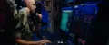 A United States Navy fire control technician operates equipment aboard a submarine during an exercise.